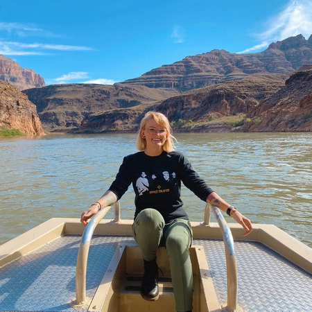 boat on colorado river bottom of grand canyon