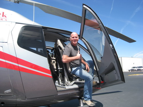 passenger seated inside a maverick ecostar helicopter